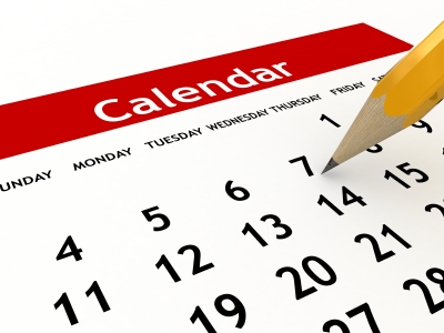 Calendar with a pencil pointing