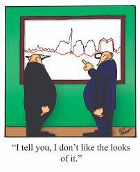 EconomistsLookingAtAGraph